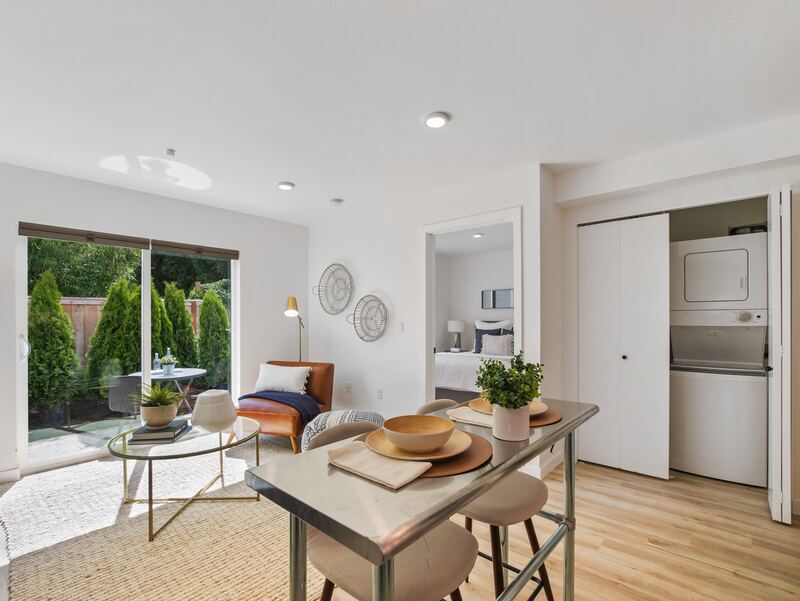 Living room with sliding door to a private patio